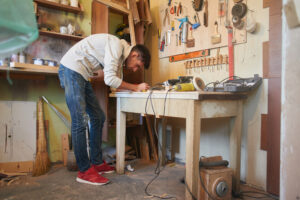 Person in a tool-filled workshop