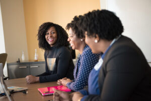 Three women in a meeting. Photo by Christina @ wocintechchat.com, via Unsplash