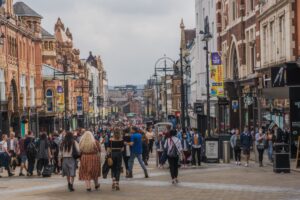 Crowds walking down UK High Street