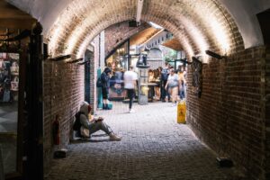 Camden market arch way with shoppers walking around